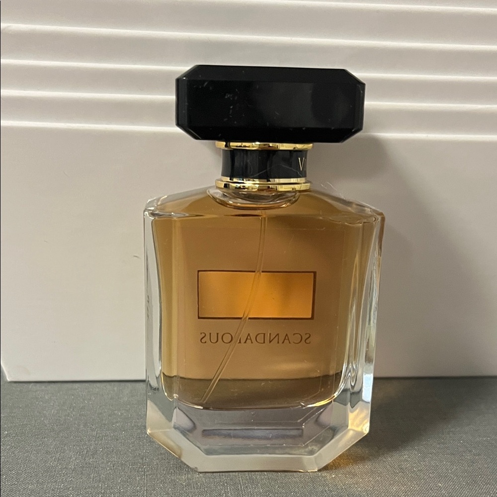 Victoria's Secret Scandalous Perfume with Black Cap and Gold Hue - Picture 2 of 3